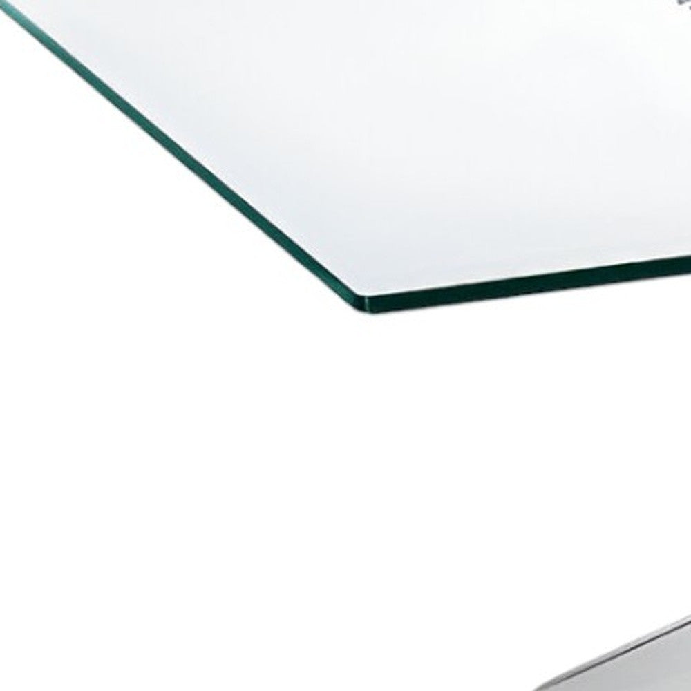 47" Clear and Silver Glass And Steel Cross Legs Coffee Table - Loft&Timber