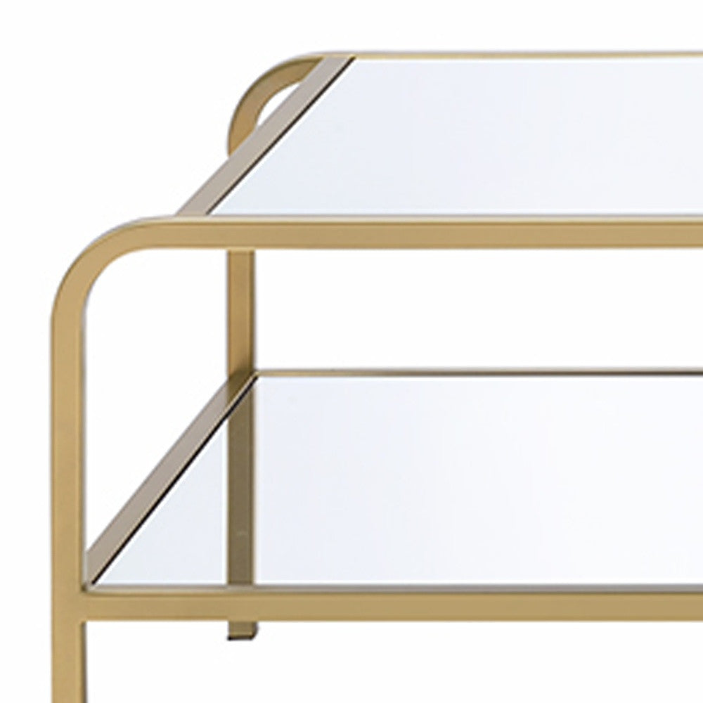 52" Clear and Gold Mirrored Glass And Iron Coffee Table With Shelf - Loft&Timber