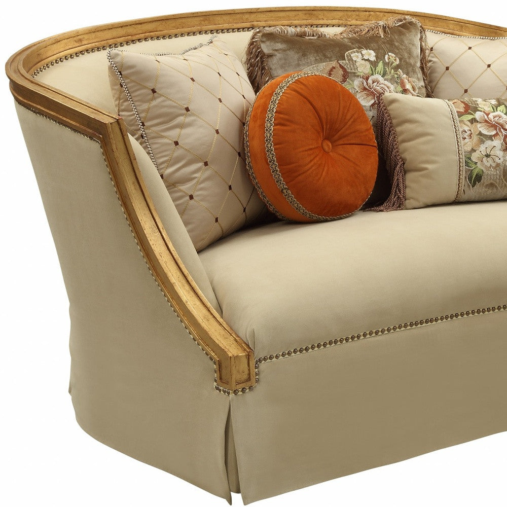 70" Tan And Gold Curved Loveseat and Toss Pillows - Loft&Timber