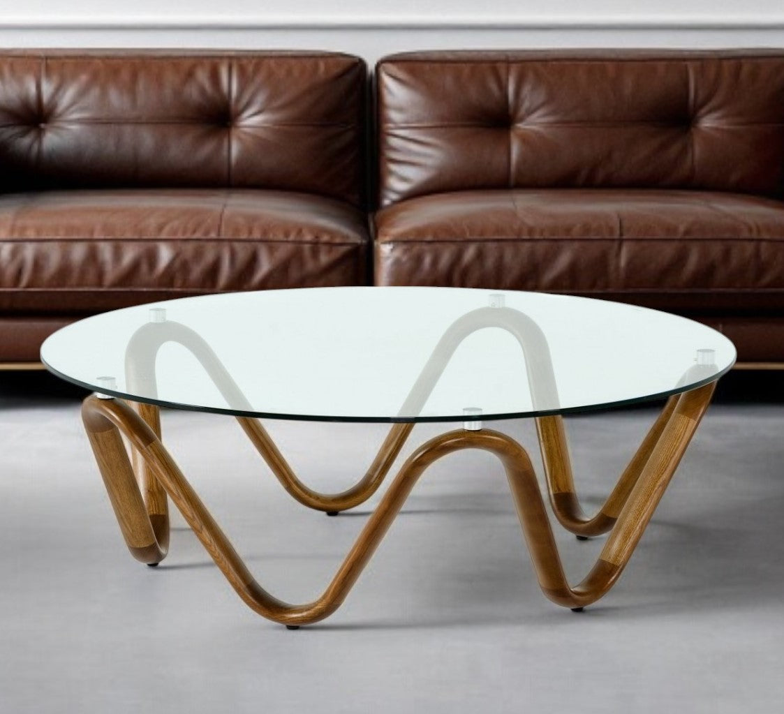 45" Clear and Brown Glass And Solid Wood Round Abstract Coffee Table - Loft&Timber