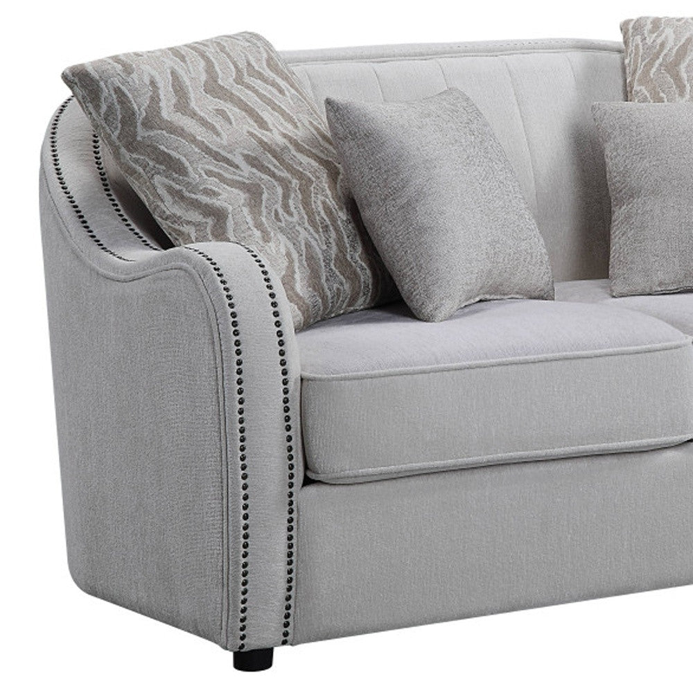 63" Beige And Black Linen Curved Loveseat and Toss Pillows - Loft&Timber