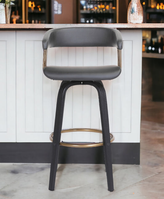 31" Gray And Black Faux Leather Swivel Bar Height Bar Chair - Loft&Timber
