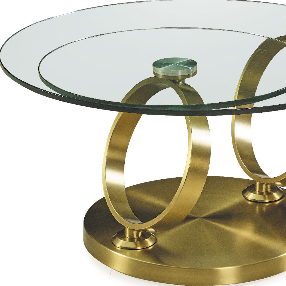 32" Clear And Gold Glass And Metal Round Abstract Coffee Table - Loft&Timber