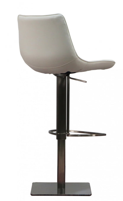 29" White and Silver Faux Leather and Stainless Steel Bar Height Swivel Bar Chair - Loft&Timber