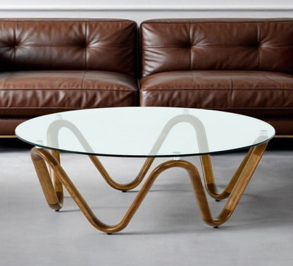 45" Clear and Brown Glass And Solid Wood Round Abstract Coffee Table - Loft&Timber