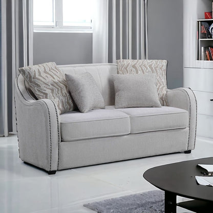 63" Beige And Black Linen Curved Loveseat and Toss Pillows - Loft&Timber