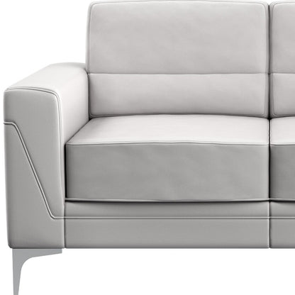 63" Light Gray And Silver Faux Leather Loveseat - Loft&Timber