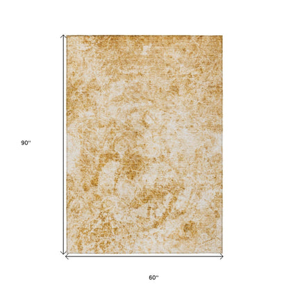 5' X 8' Cream and Gold Abstract Washable Non Skid Indoor Outdoor Area Rug - Loft&Timber