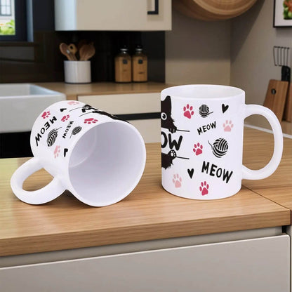A Black Cat Sitting On Top Of A Bar With Paw Prints And The Word Meow Cup, 11oz Ceramic Cup - Loft&Timber